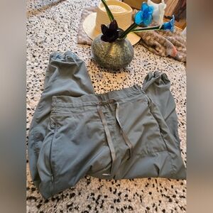 Apana brand. Size small/medium. Green. 3/4 cropped joggers. Elastic drawstring